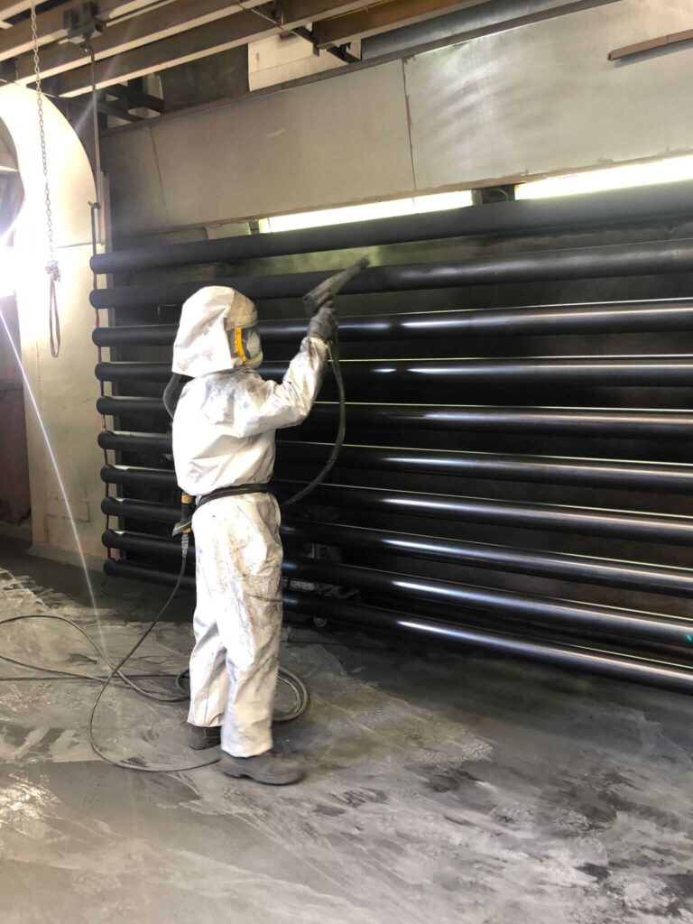 verniciatura manuale termoplastico per tiranti iniettori rocce
